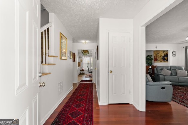 625 Hickory Nobb, Sugar Hill, GA 30518 - hall featuring wood finished floors and a textured ceiling