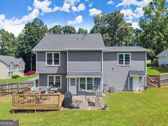 625 Hickory Nobb, Sugar Hill, GA 30518 - rear view of house with a fenced backyard, a patio, and a deck
