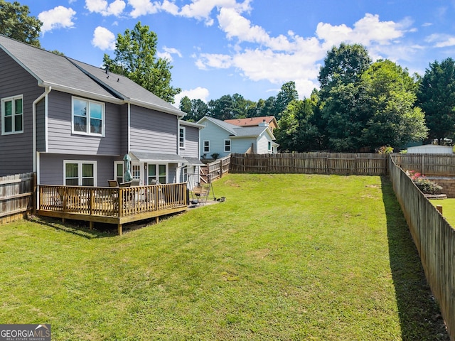 625 Hickory Nobb, Sugar Hill, GA 30518 - fenced backyard featuring a wooden deck