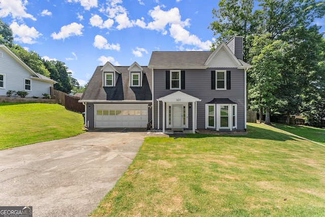 625 Hickory Nobb, Sugar Hill, GA 30518 - view of front facade with a chimney, concrete driveway, a garage, and roof with shingles