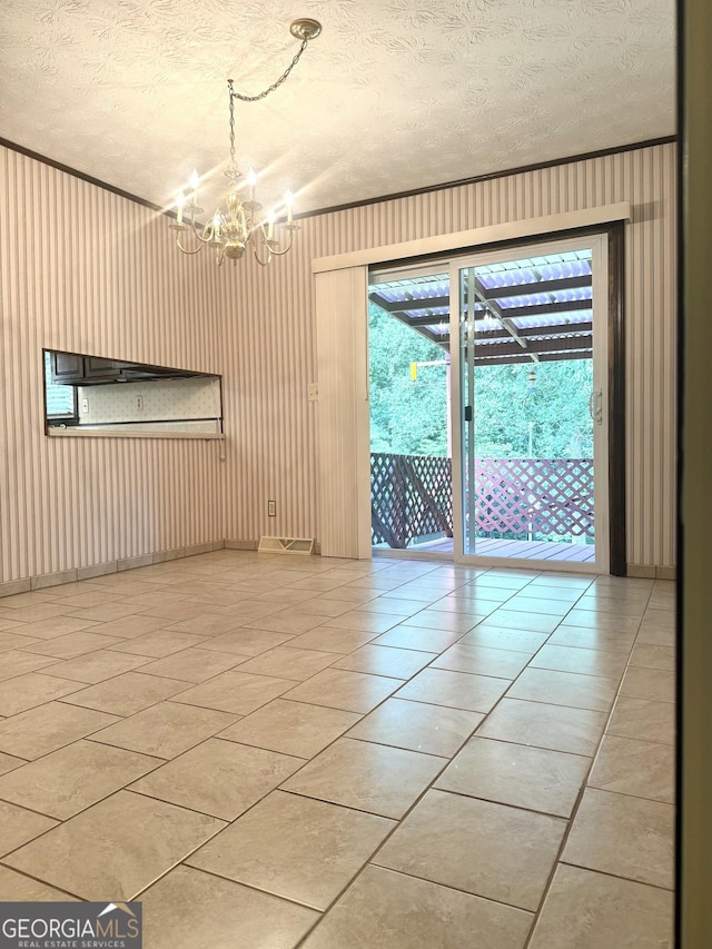 10 Montre Cir SE, Silver Creek, GA 30173 - unfurnished room featuring a chandelier, a textured ceiling, and light tile patterned flooring