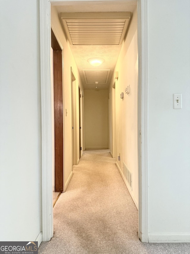 10 Montre Cir SE, Silver Creek, GA 30173 - corridor with attic access and carpet