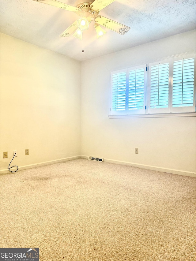 10 Montre Cir SE, Silver Creek, GA 30173 - carpeted empty room with baseboards and ceiling fan