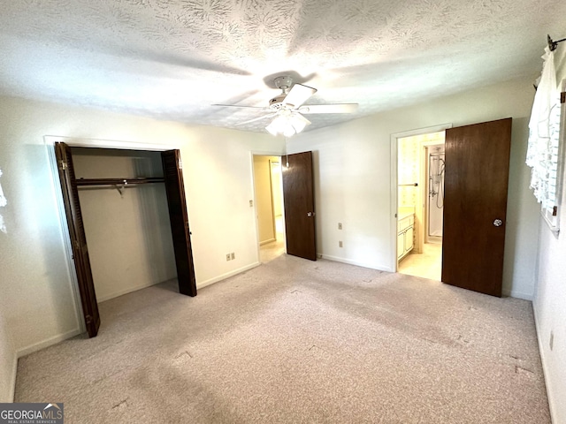 10 Montre Cir SE, Silver Creek, GA 30173 - unfurnished bedroom featuring a closet, light carpet, a textured ceiling, ensuite bathroom, and ceiling fan