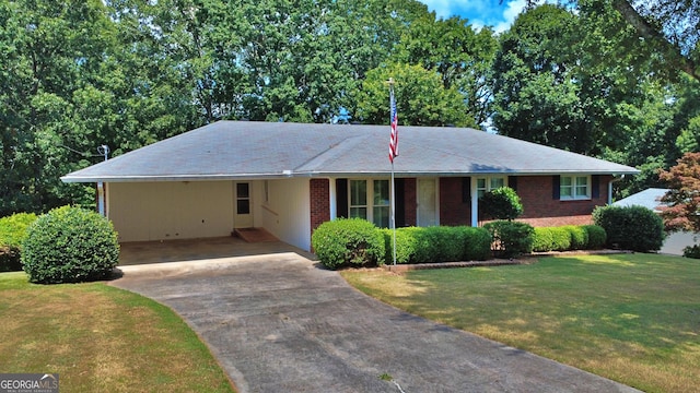 10 Montre Cir SE, Silver Creek, GA 30173 - single story home with driveway, a front lawn, a carport, and brick siding