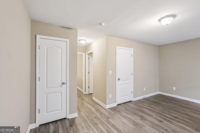 1159 Smith St SW, Atlanta, GA 30310 - unfurnished room with wood finished floors and a smoke detector