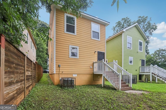 1159 Smith St SW, Atlanta, GA 30310 - back of house featuring stairway and a lawn