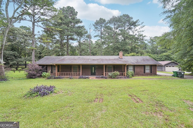 5618 Shadow Rock Dr, Lithonia, GA 30058 - single story home featuring a porch, a front lawn, and a chimney
