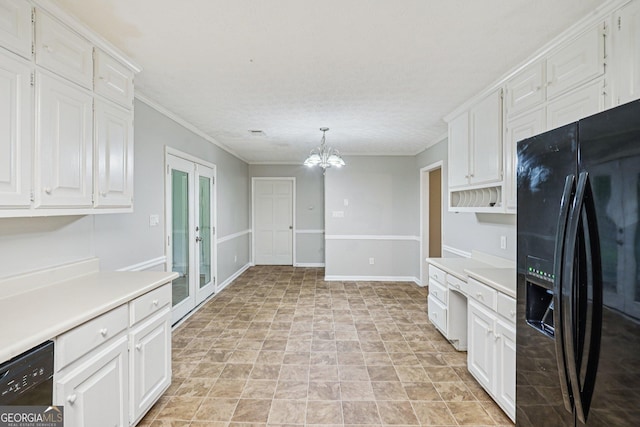 5618 Shadow Rock Dr, Lithonia, GA 30058 - kitchen featuring black appliances, white cabinetry, a chandelier, light countertops, and crown molding