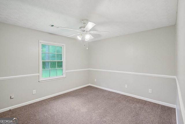5618 Shadow Rock Dr, Lithonia, GA 30058 - unfurnished room with carpet floors, ceiling fan, and a textured ceiling