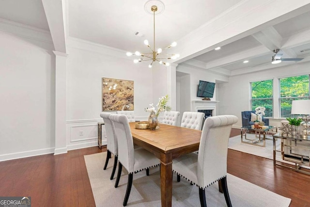 5534 Parkerton Ln, Sandy Springs, GA 30342 - dining space with ornamental molding, hardwood / wood-style floors, beamed ceiling, a chandelier, and a fireplace