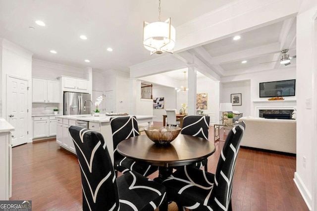 5534 Parkerton Ln, Sandy Springs, GA 30342 - dining room with ornamental molding, dark wood-style flooring, a chandelier, recessed lighting, and beam ceiling