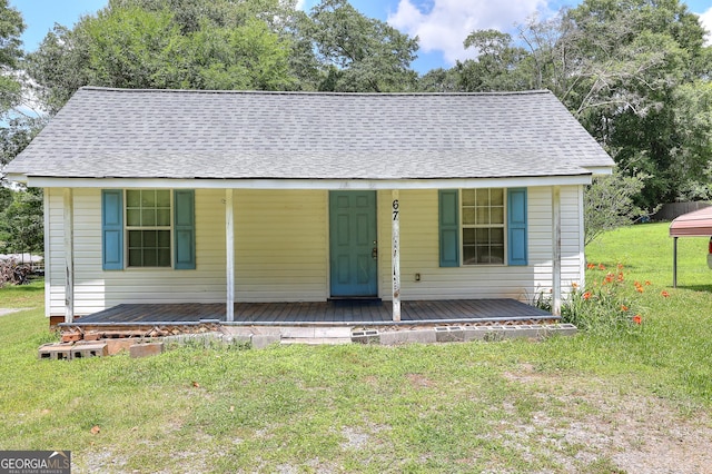 67 Cotton St, Commerce, GA 30529 - view of front of house featuring a front yard and a shingled roof