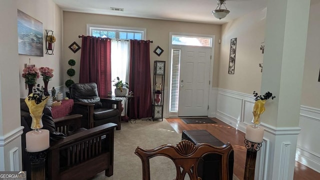 2435 Hickory Station Cir, Snellville, GA 30078 - foyer entrance featuring a wainscoted wall and a decorative wall