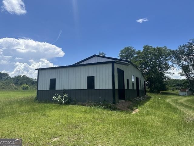 9 June Ln, Eastman, GA 31023 - view of side of home with a pole building and an outbuilding