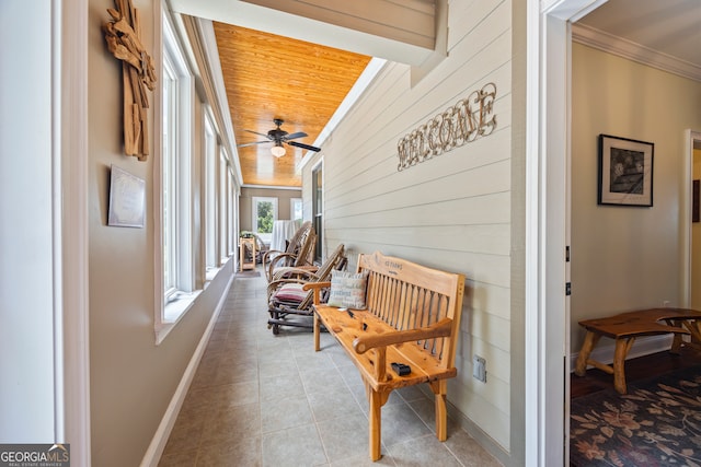 290 Vinson Rd, Tignall, GA 30668 - sunroom / solarium featuring ornamental molding, tile patterned flooring, wooden walls, and wood ceiling