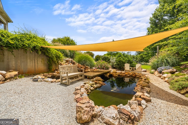 290 Vinson Rd, Tignall, GA 30668 - view of yard with a small pond