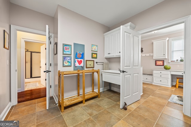290 Vinson Rd, Tignall, GA 30668 - interior space featuring built in desk and stone tile flooring