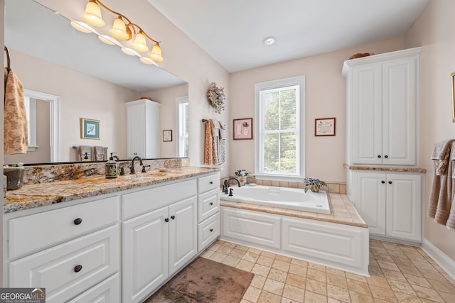290 Vinson Rd, Tignall, GA 30668 - bathroom featuring vanity and a garden tub