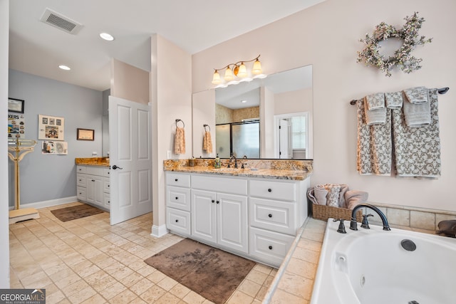 290 Vinson Rd, Tignall, GA 30668 - bathroom featuring vanity, a shower stall, a jetted tub, and recessed lighting