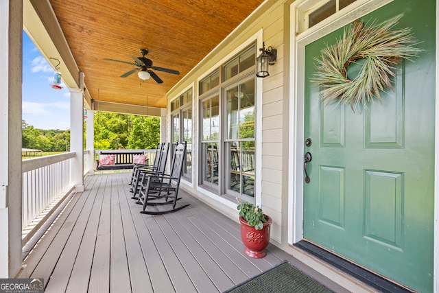 290 Vinson Rd, Tignall, GA 30668 - wooden porch featuring a ceiling fan