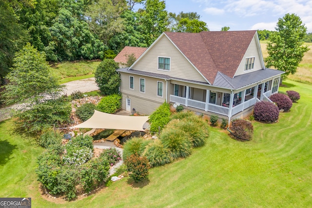 290 Vinson Rd, Tignall, GA 30668 - back of property featuring a standing seam roof, a metal roof, a lawn, covered porch, and a shingled roof