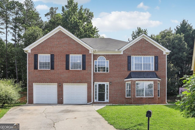 2379 Fallbrook Ct, Duluth, GA 30096 - view of front of house with concrete driveway, a garage, a front lawn, and brick siding