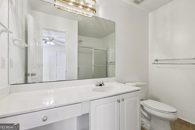 2379 Fallbrook Ct, Duluth, GA 30096 - full bathroom featuring vanity, a shower with shower door, a ceiling fan, and tile patterned flooring