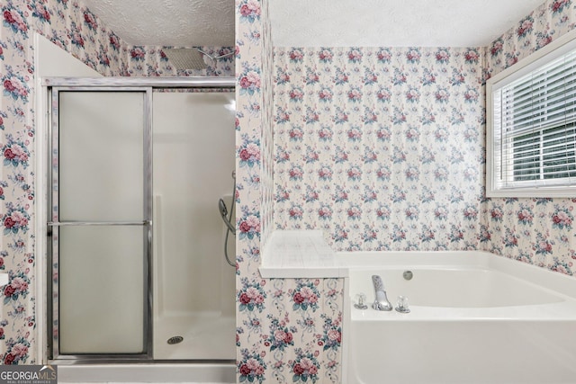 2379 Fallbrook Ct, Duluth, GA 30096 - full bathroom featuring wallpapered walls, a textured ceiling, a stall shower, and a garden tub