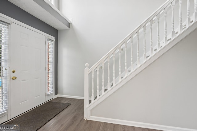 2379 Fallbrook Ct, Duluth, GA 30096 - entryway with wood finished floors and stairway