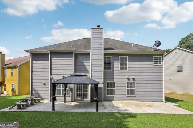 2379 Fallbrook Ct, Duluth, GA 30096 - back of house featuring a gazebo, a patio, a yard, and a chimney