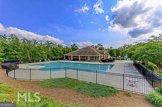 250 Mulberry Dr, Senoia, GA 30276 - community pool featuring a patio