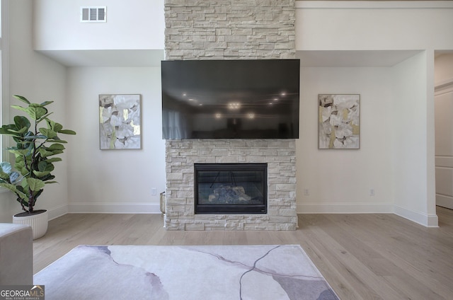 841 Keystone Dr, Woodstock, GA 30188 - living area featuring a fireplace and wood finished floors