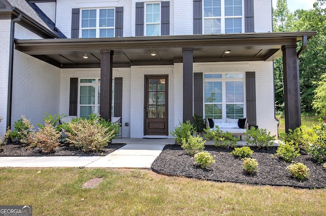 841 Keystone Dr, Woodstock, GA 30188 - property entrance with a porch and brick siding