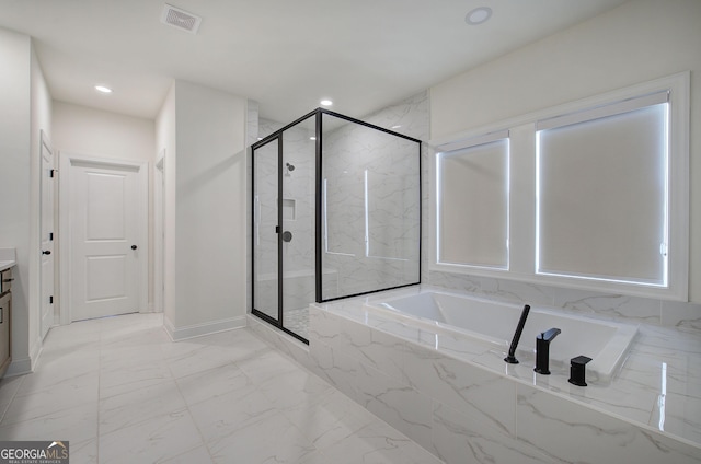 841 Keystone Dr, Woodstock, GA 30188 - full bath featuring a bath, a marble finish shower, marble finish floors, vanity, and recessed lighting