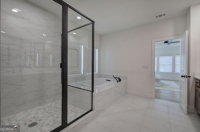 841 Keystone Dr, Woodstock, GA 30188 - bathroom featuring a garden tub, a marble finish shower, vanity, marble look tile flooring, and recessed lighting