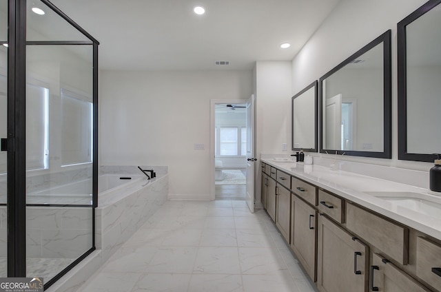 841 Keystone Dr, Woodstock, GA 30188 - full bathroom featuring marble finish floors, a bath, double vanity, a marble finish shower, and a ceiling fan