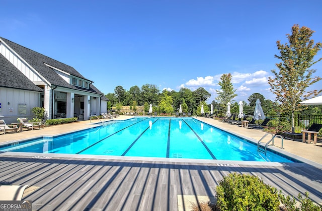 841 Keystone Dr, Woodstock, GA 30188 - community pool featuring a patio