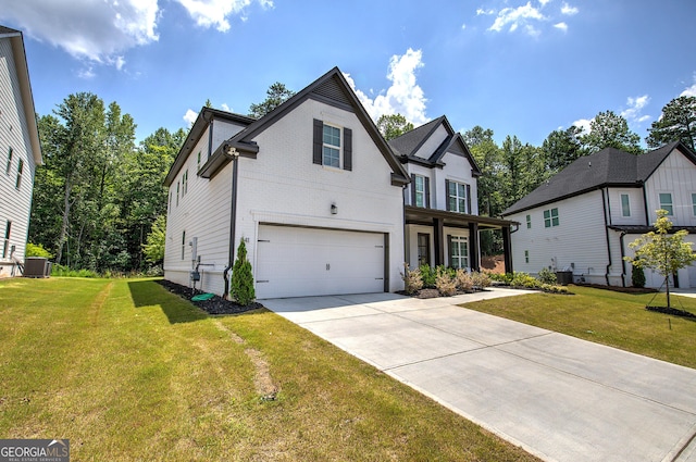 841 Keystone Dr, Woodstock, GA 30188 - view of front of house with a garage, concrete driveway, a front lawn, and brick siding