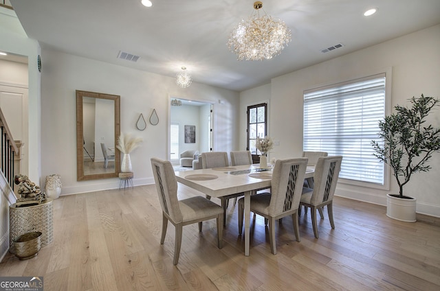 841 Keystone Dr, Woodstock, GA 30188 - dining space with a chandelier, plenty of natural light, light wood finished floors, and recessed lighting
