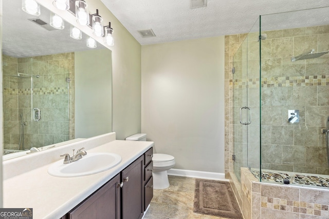 125 Meadow View Dr, Jackson, GA 30233 - bathroom featuring vanity, a shower stall, and a textured ceiling