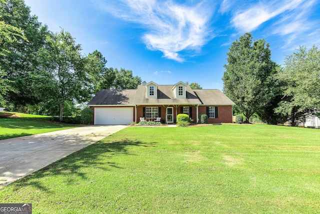 125 Meadow View Dr, Jackson, GA 30233 - new england style home featuring driveway, a garage, brick siding, and a front lawn