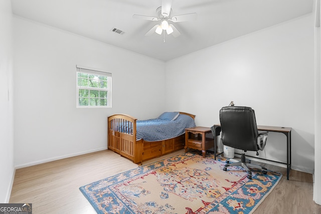 265 Hidden Hammock Dr, Vidalia, GA 30474 - bedroom with wood finished floors and a ceiling fan