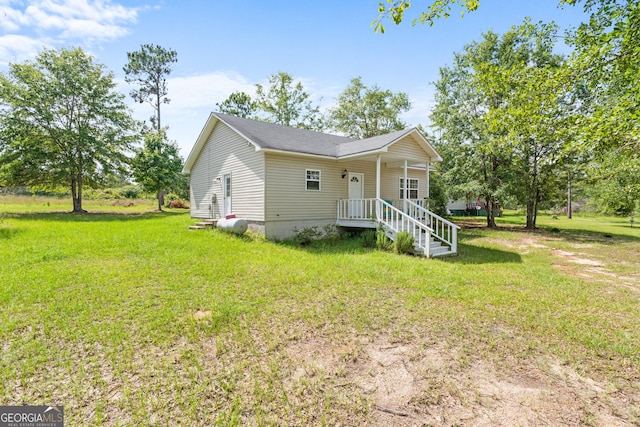 265 Hidden Hammock Dr, Vidalia, GA 30474 - view of front facade with a front lawn