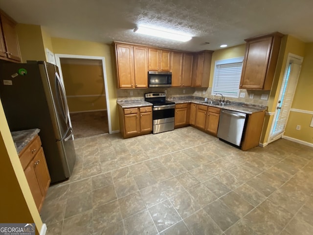 1472 Queenie Smith Rd NE, Conyers, GA 30012 - kitchen with stainless steel appliances and brown cabinets