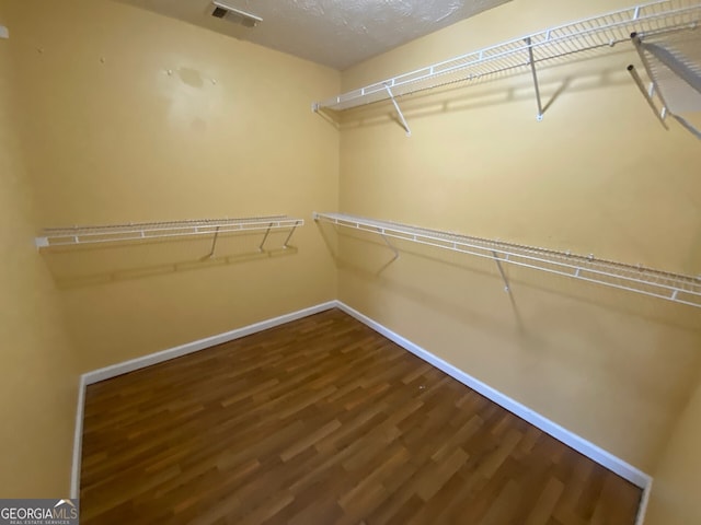 1472 Queenie Smith Rd NE, Conyers, GA 30012 - spacious closet featuring wood finished floors