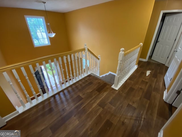 1472 Queenie Smith Rd NE, Conyers, GA 30012 - staircase featuring wood finished floors and baseboards