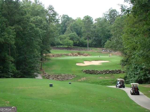 1472 Queenie Smith Rd NE, Conyers, GA 30012 - view of property's community with view of golf course and a lawn
