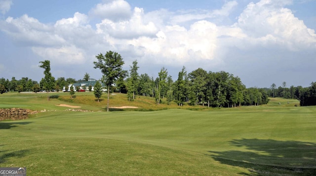 1472 Queenie Smith Rd NE, Conyers, GA 30012 - view of property's community featuring view of golf course, a lawn, and view of scattered trees