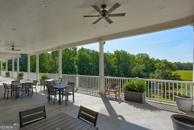 1472 Queenie Smith Rd NE, Conyers, GA 30012 - view of patio featuring outdoor dining space and a ceiling fan